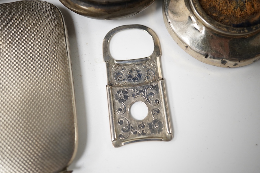 A collection of mainly small silver items including a George V posy vase, mother of pearl handled fruit knife, sovereign case, cream jug, tortoiseshell and silver trinket box (a.f.), continental miniature white metal tan